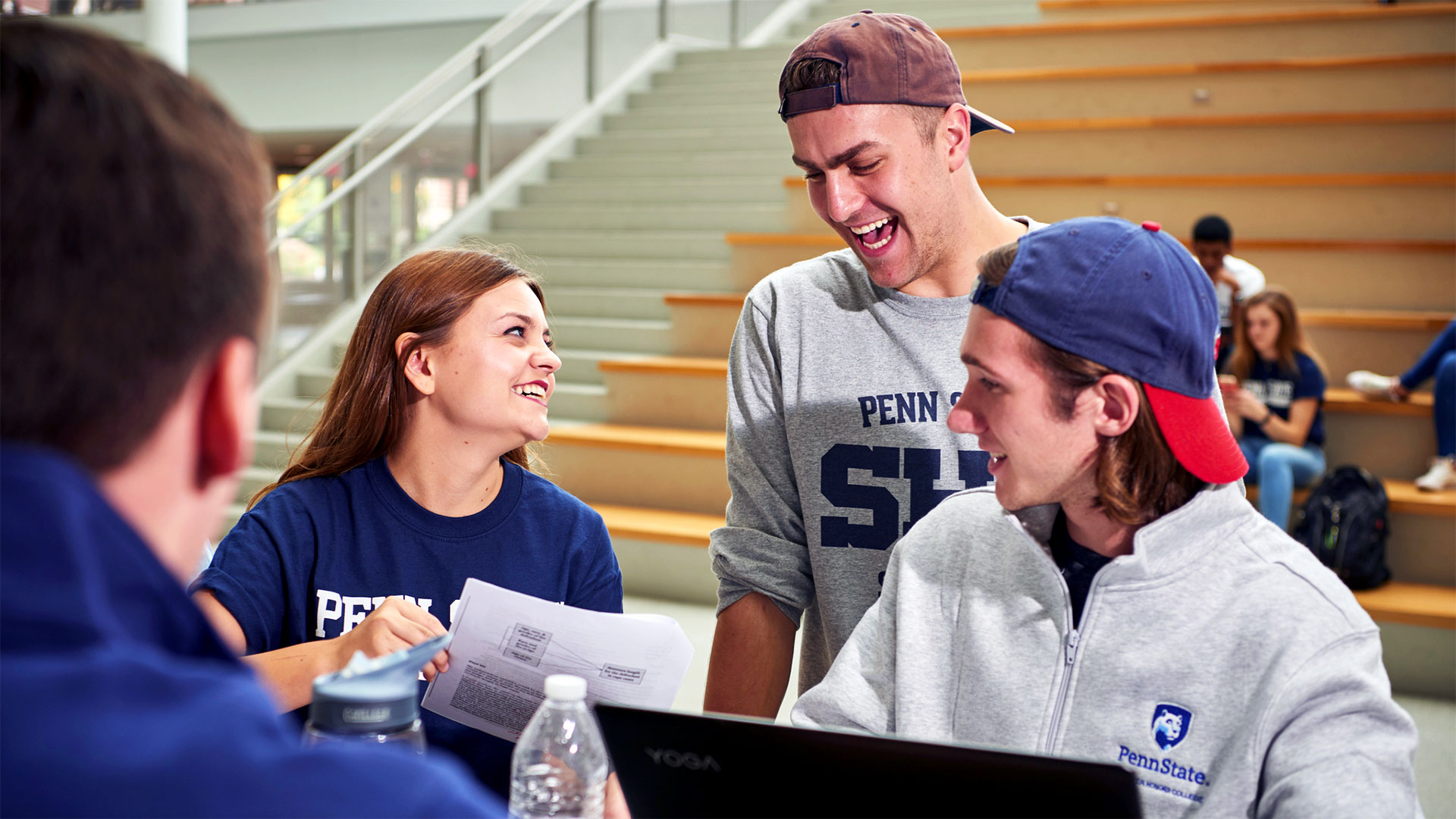 Schreyer Scholars laughing and working in the HUB
